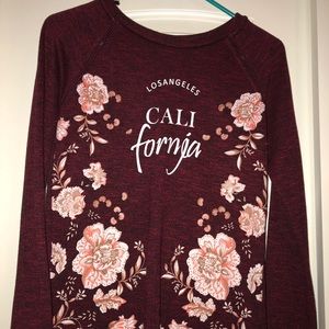 Maroon sweater with flower print
